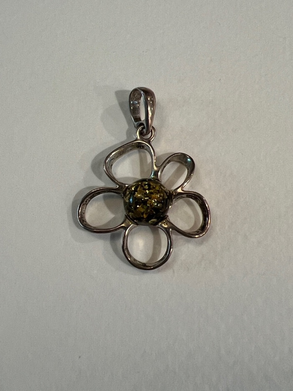 Sterling Silver Flower Pendant with Green/Brown Baltic Amber Center
